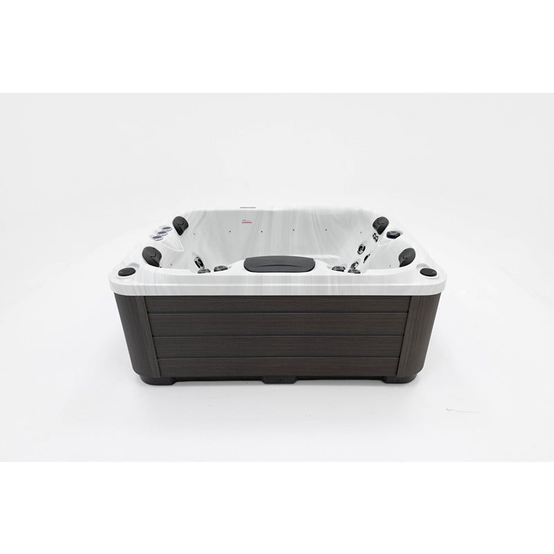 Platinum Spas Tahiti Hot Tub - rear top view with ergonomically arranged massage seats and dark wood cladding for a modern outdoor spa design